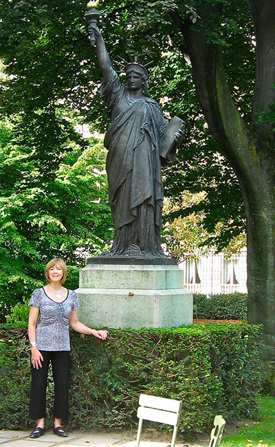 Lynn Rymarz at the Statue of Liberty